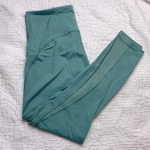 Lululemon 7/8 leggings with mesh detail.